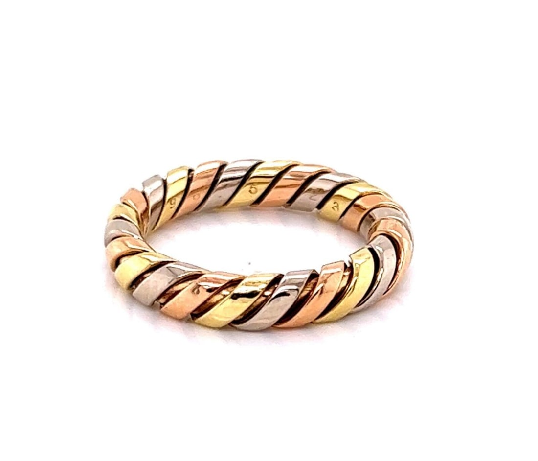 Bvlgari Tubogas band ring in 18k tri color gold size 6.5: Bvlgari Tubogas band ring in 18k tri color gold size 6.5 Authentic Bvlgari Tubogas tri-color band ring crafted in 18k yellow, white, and rose gold. This signed fine jewelry piece features the collecti