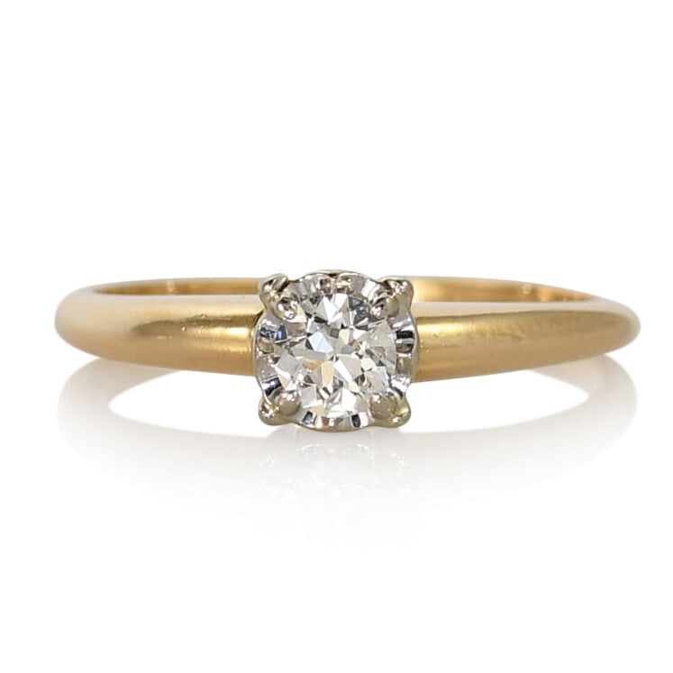 Vintage 14K Yellow Gold Euro Cut Diamond Ring 0.25ct Size 6.75: Vintage 14K Yellow Gold Euro Cut Diamond Ring 0.25ct Size 6.75 This vintage ladies' solitaire ring features a 0.25 carat old Euro cut natural diamond set in a 14K yellow gold setting. The diamond is g