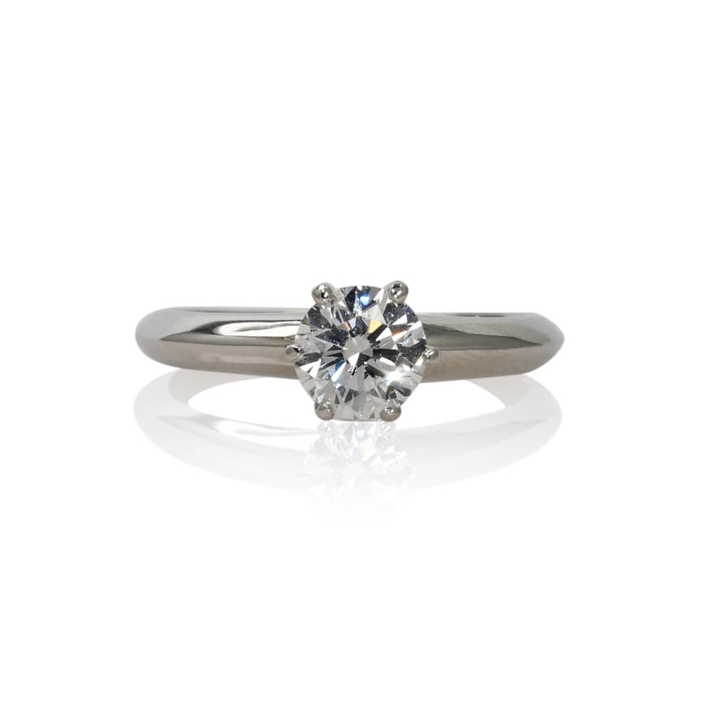 GIA Certified Platinum Round Brilliant Diamond Ring 0.77 ct Size 5.5: GIA Certified Platinum Round Brilliant Diamond Ring 0.77 ct Size 5.5 This platinum engagement ring features a GIA-certified round brilliant diamond weighing 0.77 carats, graded D for color and VS2 for