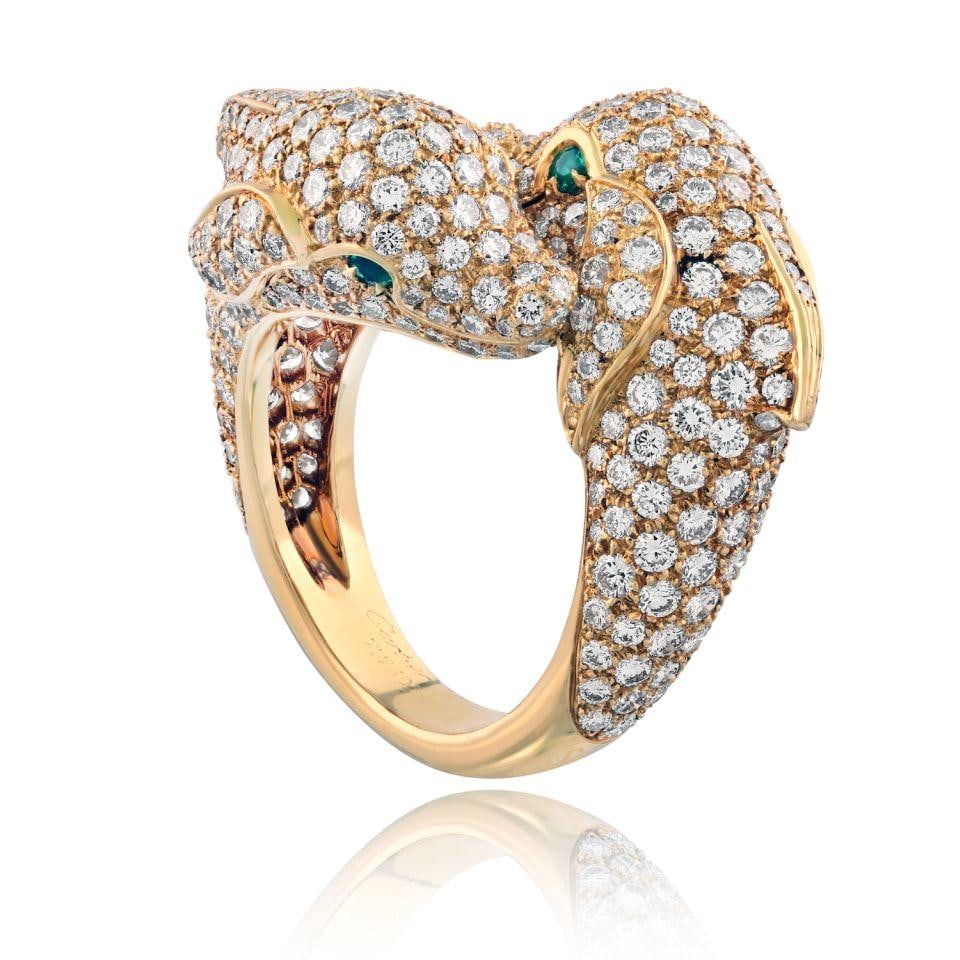Cartier Double Dolphin Ring 18K Yellow Gold with 4.45 Cts Diamonds: Cartier Double Dolphin Ring 18K Yellow Gold with 4.45 Cts Diamonds Estate ring by Cartier featuring a double dolphin design in 18K yellow gold. The ring is pav-set with approximately 4.45 carats of ro