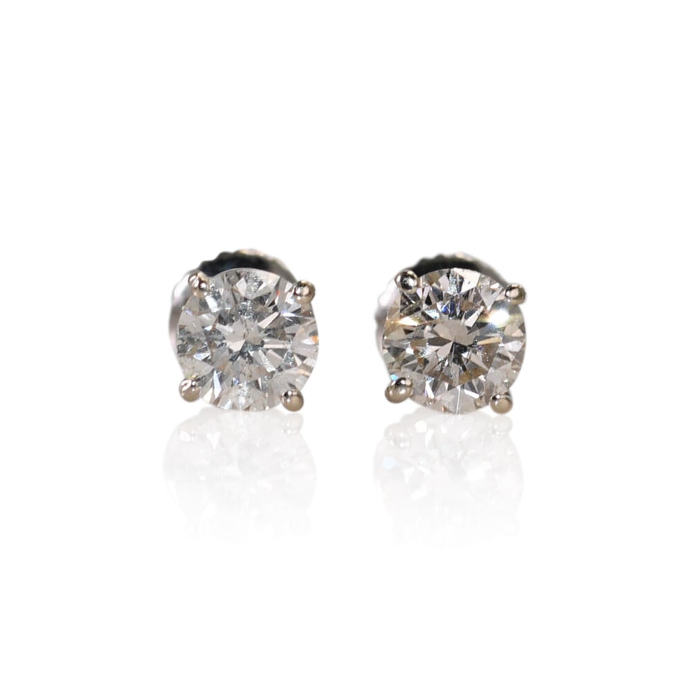 14K White Gold Round Diamond Screw Back Stud Earrings: 14K White Gold Round Diamond Screw Back Stud Earrings These diamond stud earrings feature round brilliant cut natural diamonds set in 14k white gold. The diamonds have a total carat weight of approxim