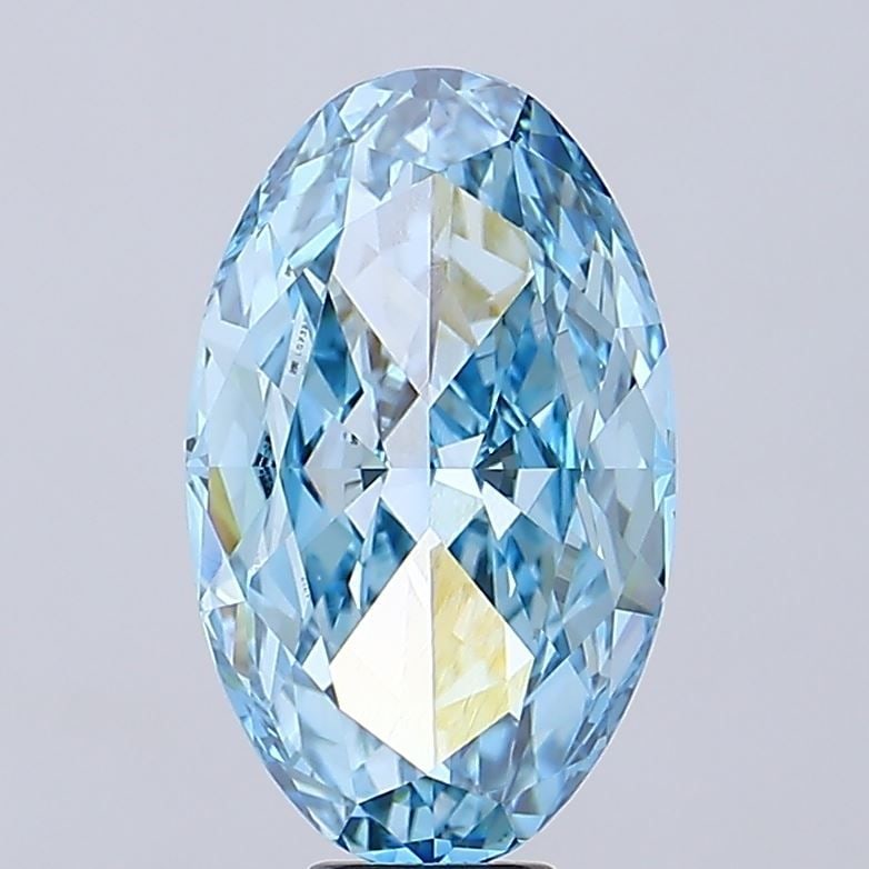 Loose Diamond - OVAL 12.07ct Fancy Vivid Blue VVS2: Loose Diamond - OVAL 12.07ct Fancy Vivid Blue VVS2 Source: This is a real non-mined Diamond that has been grown in a lab Shape: OVAL Carats: 12.07 Color: Fancy Vivid Blue Certification: IGI Video:
