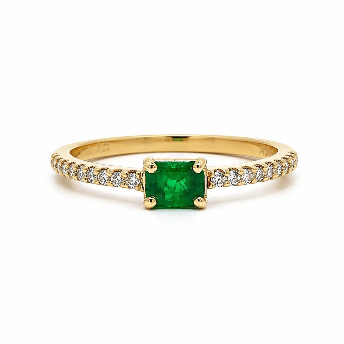 Unbranded 14k Yellow Gold Emerald Ring with Diamond Accent Sides: Unbranded 14k Yellow Gold Emerald Ring with Diamond Accent Sides Delicate yet eye-catching, this pre-owned cocktail ring features a natural rectangular step-cut emerald set east-west and accented by d
