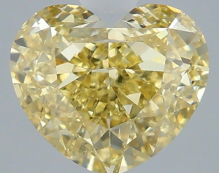 Loose Diamond - HEART 3.05ct Fancy Intense Yellow VS1: Loose Diamond - HEART 3.05ct Fancy Intense Yellow VS1 Source: This is a real non-mined Diamond that has been grown in a lab Shape: HEART Carats: 3.05 Color: Fancy Intense Yellow Certification: IGI Vid