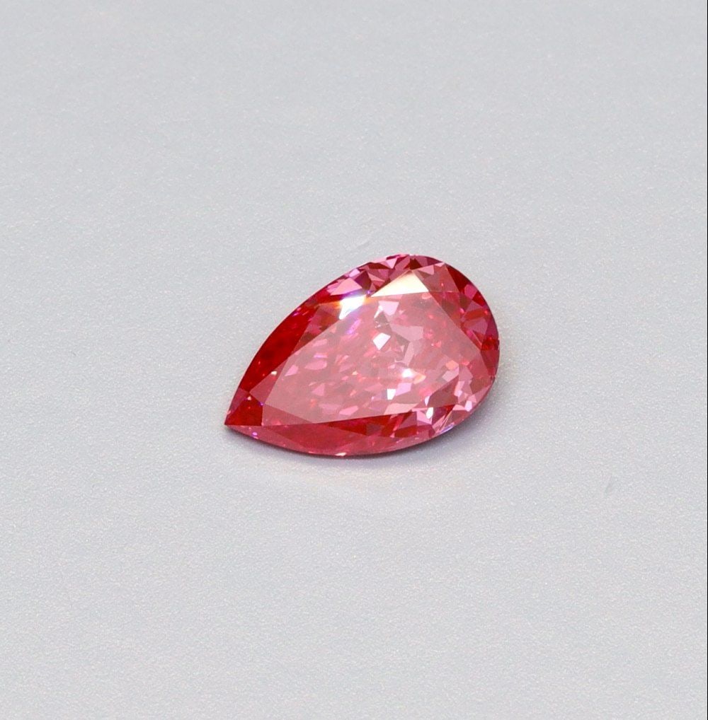 Loose Diamond - PEAR 1.02ct Fancy Vivid Pink VS1: Loose Diamond - PEAR 1.02ct Fancy Vivid Pink VS1 Source: This is a real non-mined Diamond that has been grown in a lab Shape: PEAR Carats: 1.02 Color: Fancy Vivid Pink Certification: IGI Video:
