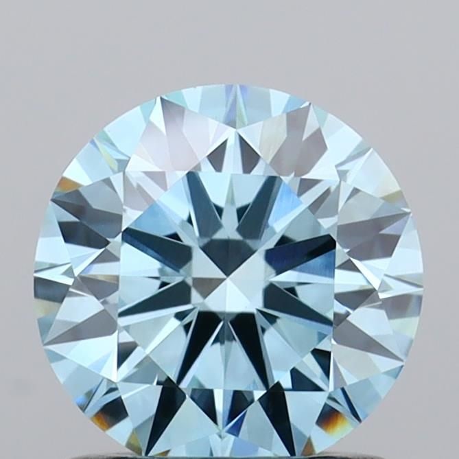 Ideal Loose Diamond - ROUND 1.01ct Fancy Vivid Blue VVS2: Ideal Loose Diamond - ROUND 1.01ct Fancy Vivid Blue VVS2 Source: This is a real non-mined Diamond that has been grown in a lab Shape: ROUND Carats: 1.01 Color: Fancy Vivid Blue Certification: IGI Vide