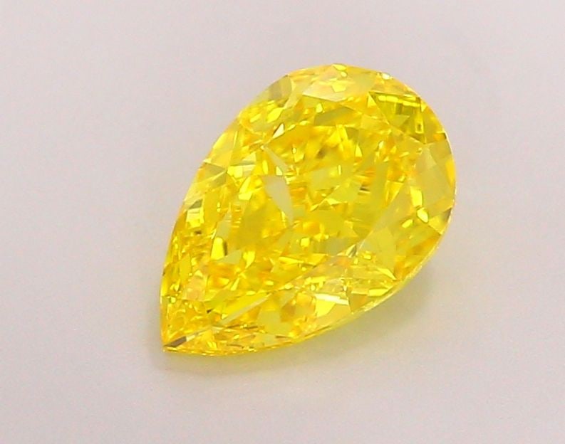 Loose Diamond - PEAR 2.19ct Fancy Vivid Yellow VS1: Loose Diamond - PEAR 2.19ct Fancy Vivid Yellow VS1 Source: This is a real non-mined Diamond that has been grown in a lab Shape: PEAR Carats: 2.19 Color: Fancy Vivid Yellow Certification: IGI Video: