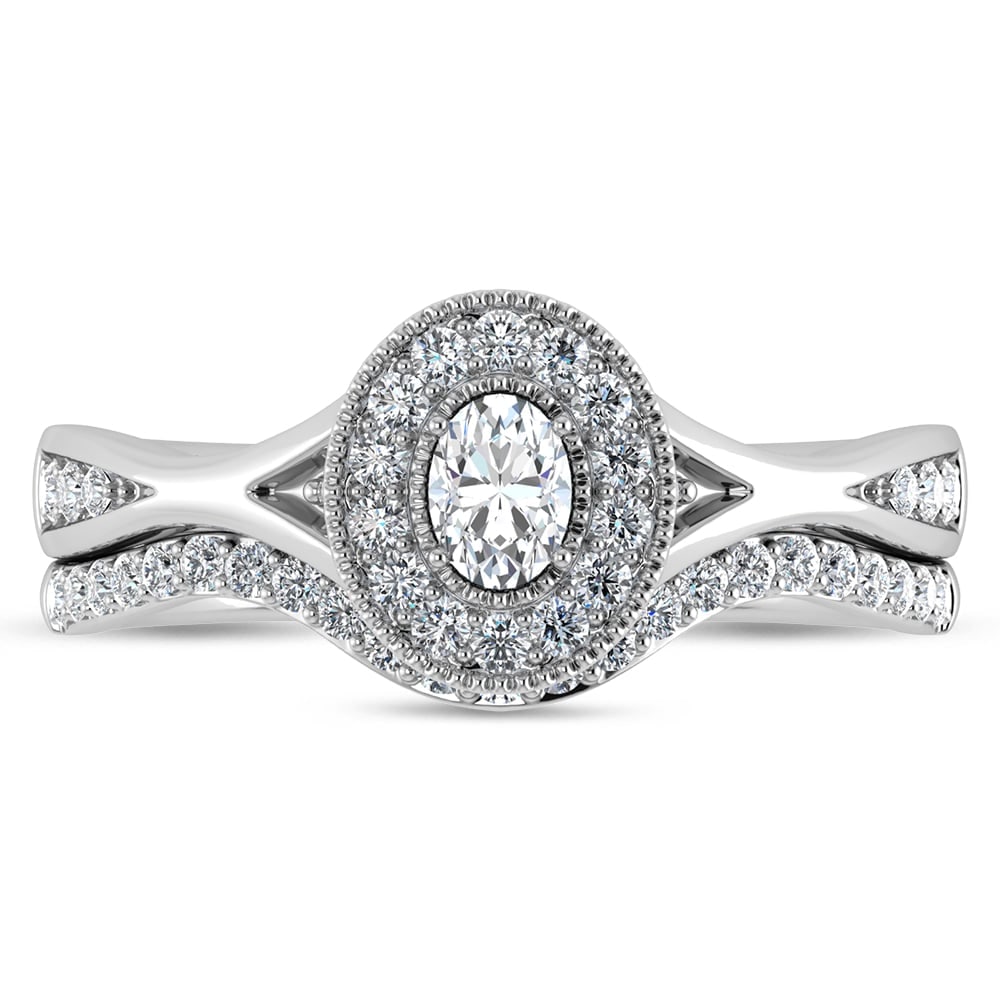Diamond 1/2 Ct.Tw. Oval Cut Bridal Ring in 14K White Gold: Diamond 1/2 Ct.Tw. Oval Cut Bridal Ring in 14K White Gold 14k White Gold Stone Color: G-h Stone Clarity: Si2 Each ring is presented in standard size 6.5. Complimentary resizing is available between si