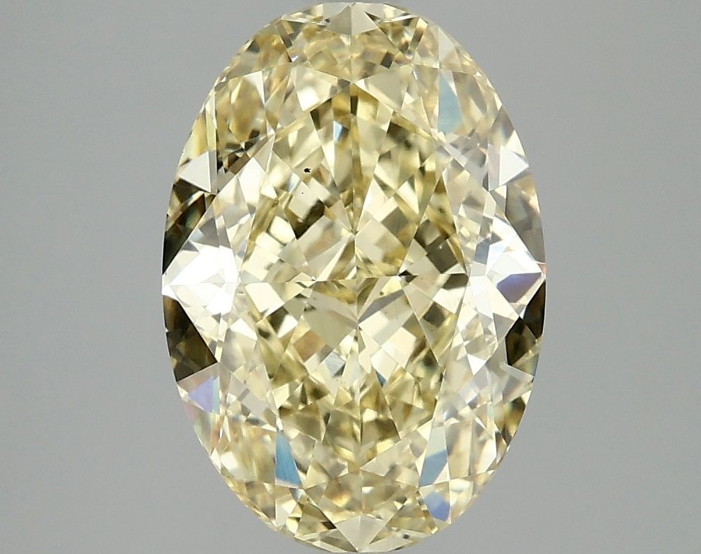 Loose Diamond - OVAL 4.1ct Fancy Vivid Yellow VS1: Loose Diamond - OVAL 4.1ct Fancy Vivid Yellow VS1 Source: This is a real non-mined Diamond that has been grown in a lab Shape: OVAL Carats: 4.1 Color: Fancy Vivid Yellow Certification: IGI Video: