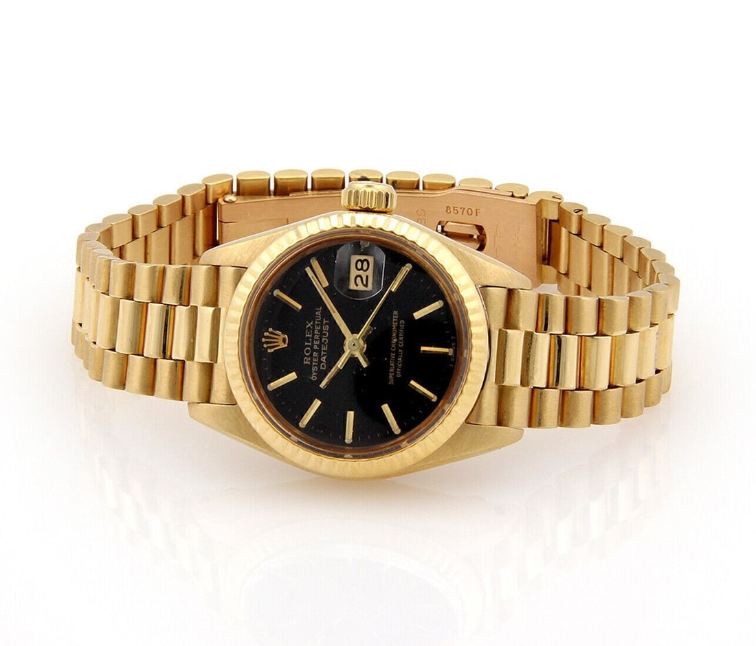 Rolex 6917 Oyster Perpetual Datejust ladies 18k gold automatic watch: Rolex 6917 Oyster Perpetual Datejust ladies 18k gold automatic watch Vintage Rolex Oyster Perpetual Datejust reference 6917 ladies wristwatch with a black dial and gold accents. Crafted in solid 18k y
