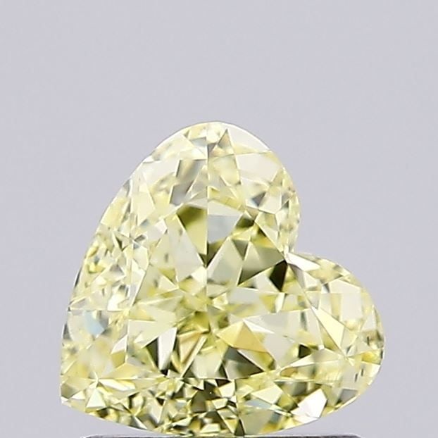 Loose Diamond - HEART 1.06ct Fancy Yellow VS1: Loose Diamond - HEART 1.06ct Fancy Yellow VS1 Source: This is a real non-mined Diamond that has been grown in a lab Shape: HEART Carats: 1.06 Color: Fancy Yellow Certification: IGI Video:
