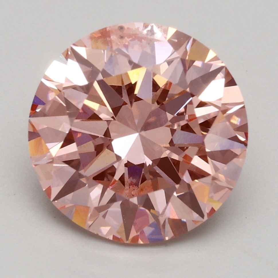 Loose Diamond - ROUND 3.05ct Fancy Intense Pink SI2: Loose Diamond - ROUND 3.05ct Fancy Intense Pink SI2 Source: This is a real non-mined Diamond that has been grown in a lab Shape: ROUND Carats: 3.05 Color: Fancy Intense Pink Certification: IGI Video: