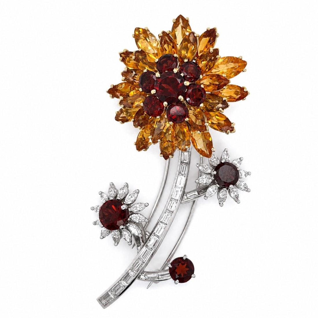 Flower Brooch in Platinum and 18K Yellow Gold with Citrine Garnet Diamonds: Flower Brooch in Platinum and 18K Yellow Gold with Citrine Garnet Diamonds A 1970s flower brooch crafted in platinum and 18K yellow gold, set with garnets, citrines, and diamonds. The design features 