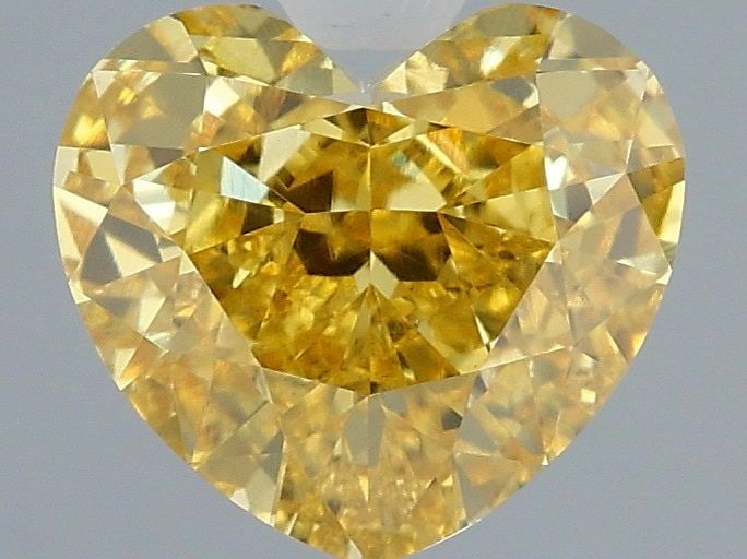Loose Diamond - HEART 2.51ct Fancy Vivid Yellow VS1: Loose Diamond - HEART 2.51ct Fancy Vivid Yellow VS1 Source: This is a real non-mined Diamond that has been grown in a lab Shape: HEART Carats: 2.51 Color: Fancy Vivid Yellow Certification: IGI Video: