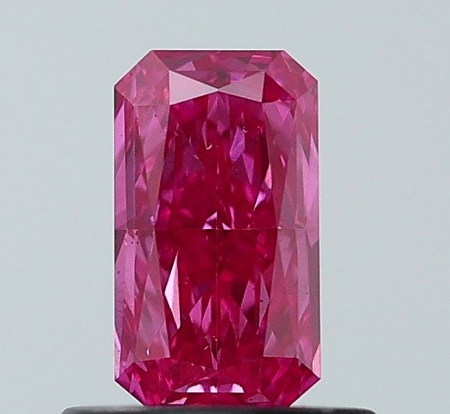 Loose Diamond - RADIANT 0.72ct Fancy Vivid Pink VS1: Loose Diamond - RADIANT 0.72ct Fancy Vivid Pink VS1 Source: This is a real non-mined Diamond that has been grown in a lab Shape: RADIANT Carats: 0.72 Color: Fancy Vivid Pink Certification: NONE Video: