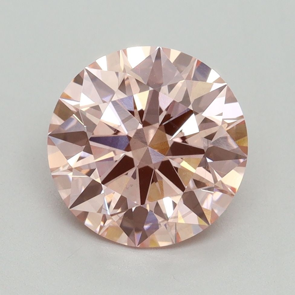 Ideal Loose Diamond - ROUND 2.59ct Fancy Vivid Pink VS2: Ideal Loose Diamond - ROUND 2.59ct Fancy Vivid Pink VS2 Source: This is a real non-mined Diamond that has been grown in a lab Shape: ROUND Carats: 2.59 Color: Fancy Vivid Pink Certification: IGI Video