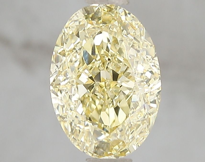 Loose Diamond - OVAL 2.01ct Fancy Intense Yellow VS2: Loose Diamond - OVAL 2.01ct Fancy Intense Yellow VS2 Source: This is a real non-mined Diamond that has been grown in a lab Shape: OVAL Carats: 2.01 Color: Fancy Intense Yellow Certification: IGI Video