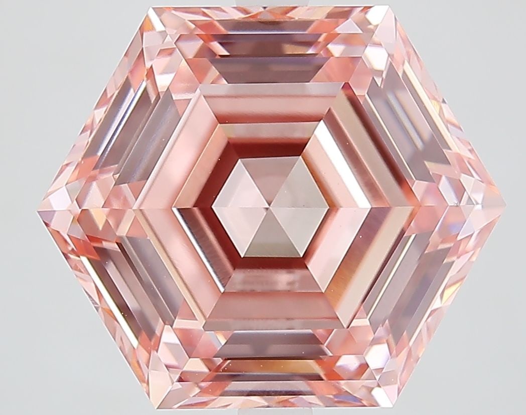 Loose Diamond - HEXAGONAL 8.03ct Fancy Vivid Pink VVS2: Loose Diamond - HEXAGONAL 8.03ct Fancy Vivid Pink VVS2 Source: This is a real non-mined Diamond that has been grown in a lab Shape: HEXAGONAL Carats: 8.03 Color: Fancy Vivid Pink Certification: IGI
