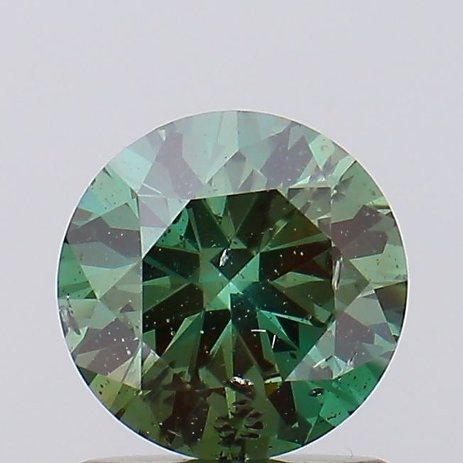 Loose Diamond - ROUND 0.99ct Fancy Vivid Green I1: Loose Diamond - ROUND 0.99ct Fancy Vivid Green I1 Source: This is a real non-mined Diamond that has been grown in a lab Shape: ROUND Carats: 0.99 Color: Fancy Vivid Green Certification: IGI Video: