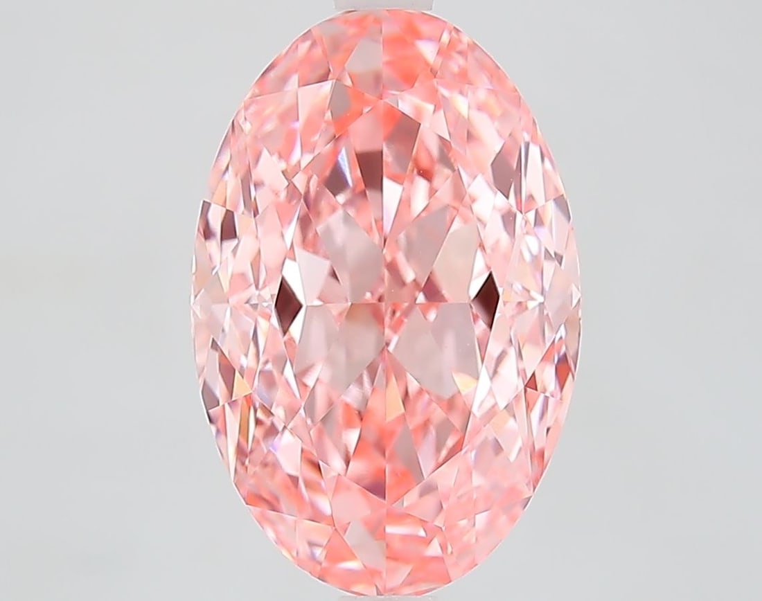 Loose Diamond - OVAL 5.1ct Fancy Vivid Pink VVS2: Loose Diamond - OVAL 5.1ct Fancy Vivid Pink VVS2 Source: This is a real non-mined Diamond that has been grown in a lab Shape: OVAL Carats: 5.1 Color: Fancy Vivid Pink Certification: IGI Video: