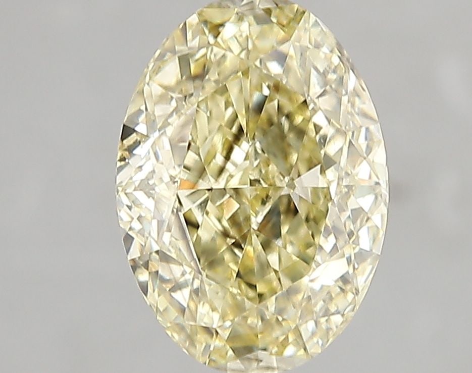 Loose Diamond - OVAL 2.59ct Fancy Yellow SI1: Loose Diamond - OVAL 2.59ct Fancy Yellow SI1 Source: This is a real non-mined Diamond that has been grown in a lab Shape: OVAL Carats: 2.59 Color: Fancy Yellow Certification: IGI Video: