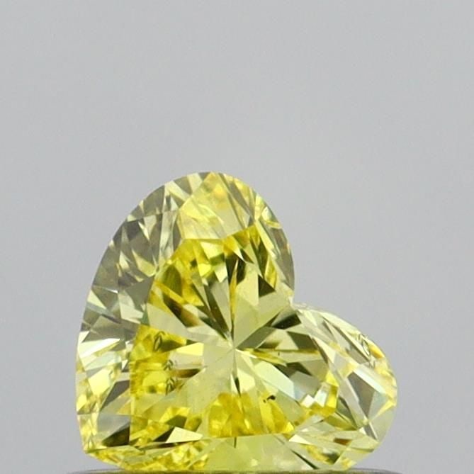 Loose Diamond - HEART 0.36ct Fancy Intense Yellow VS2: Loose Diamond - HEART 0.36ct Fancy Intense Yellow VS2 Source: This is a real non-mined Diamond that has been grown in a lab Shape: HEART Carats: 0.36 Color: Fancy Intense Yellow Certification: IGI Vid