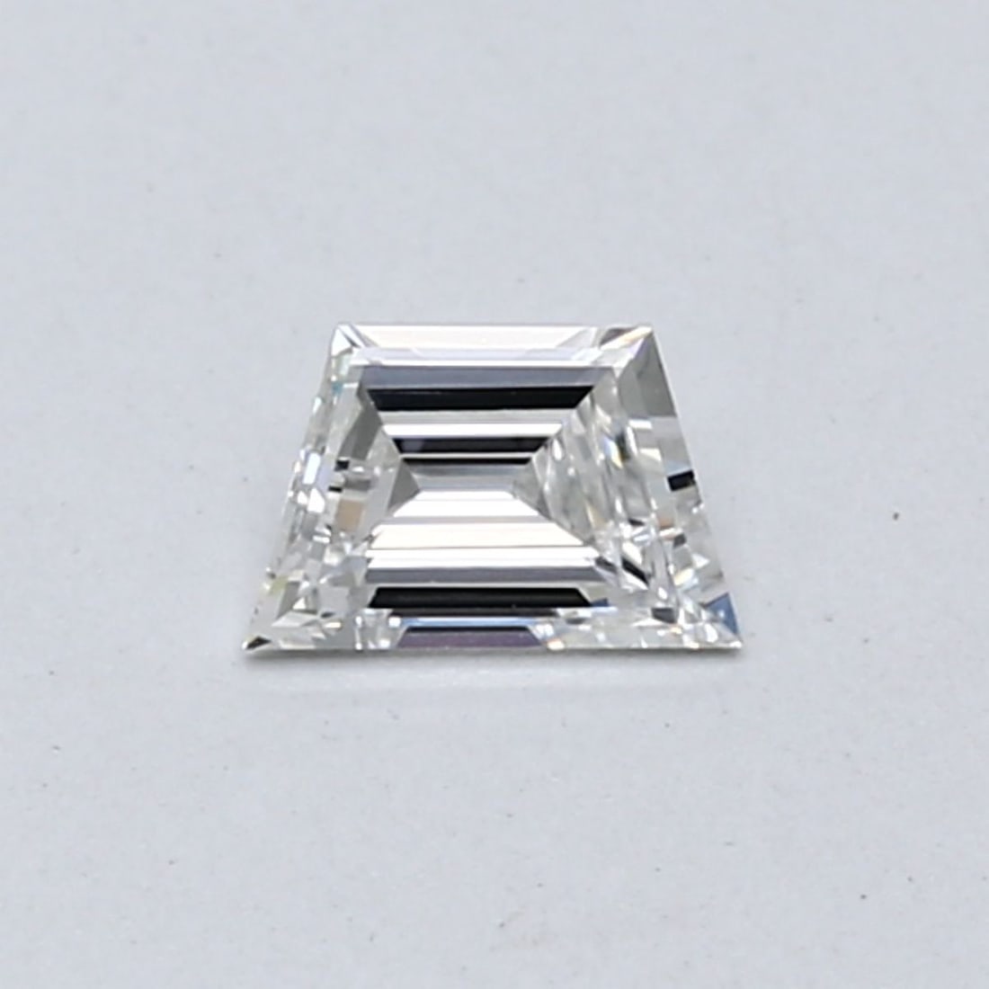 Loose Diamond - TRAPEZOID 0.24ct F VS1: Loose Diamond - TRAPEZOID 0.24ct F VS1 Source: This is a real non-mined Diamond that has been grown in a lab Shape: TRAPEZOID Carats: 0.24 Color: F Clarity: VS1 Certification: NONE The Diamond Depot G