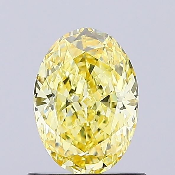 Loose Diamond - OVAL 0.91ct Fancy Intense Yellow VS1: Loose Diamond - OVAL 0.91ct Fancy Intense Yellow VS1 Source: This is a real non-mined Diamond that has been grown in a lab Shape: OVAL Carats: 0.91 Color: Fancy Intense Yellow Certification: IGI Video