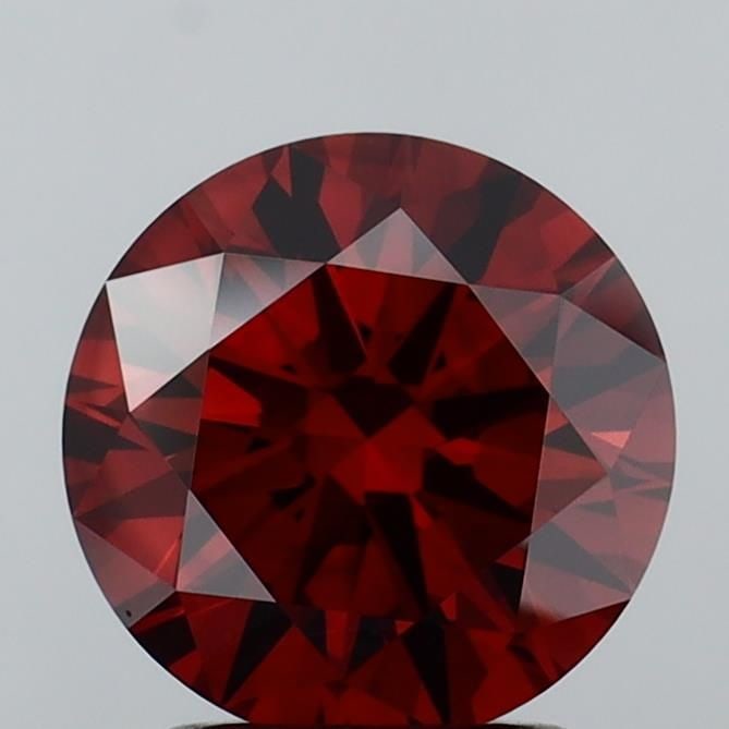 Loose Diamond - ROUND 2.04ct Fancy Orangey Brown VVS2: Loose Diamond - ROUND 2.04ct Fancy Orangey Brown VVS2 Source: This is a real non-mined Diamond that has been grown in a lab Shape: ROUND Carats: 2.04 Color: Fancy Orangey Brown Certification: IGI Vide