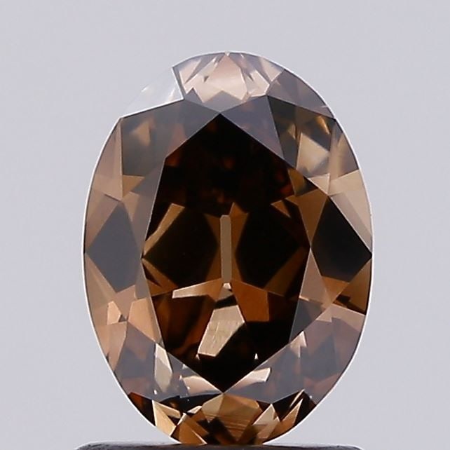 Loose Diamond - OVAL 1.35ct Fancy Brown VS2: Loose Diamond - OVAL 1.35ct Fancy Brown VS2 Source: This is a real non-mined Diamond that has been grown in a lab Shape: OVAL Carats: 1.35 Color: Fancy Brown Certification: IGI Video: