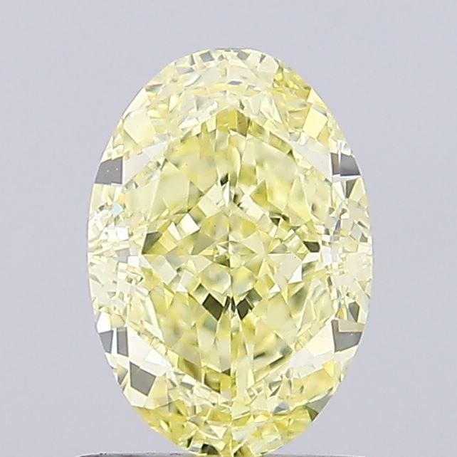 Loose Diamond - OVAL 1.07ct Fancy Yellow VVS2: Loose Diamond - OVAL 1.07ct Fancy Yellow VVS2 Source: This is a real non-mined Diamond that has been grown in a lab Shape: OVAL Carats: 1.07 Color: Fancy Yellow Certification: IGI Video: