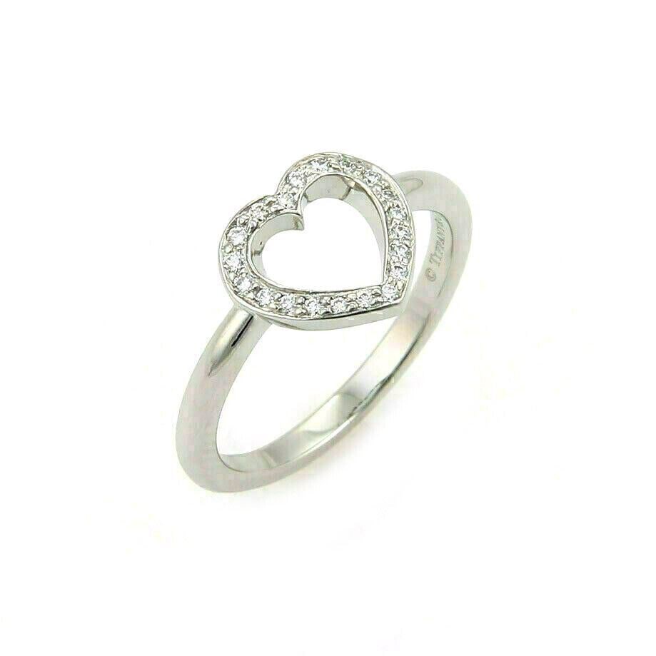 Tiffany & Co. Open Heart Diamond Ring in Pt950 Size 4.5: Tiffany & Co. Open Heart Diamond Ring in Pt950 Size 4.5 Authentic Tiffany & Co. Open Heart ring crafted in platinum with natural diamond accents. This signed ring features the brand's iconic open hear