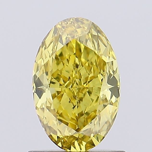Loose Diamond - OVAL 0.92ct Fancy Vivid Yellow VS1: Loose Diamond - OVAL 0.92ct Fancy Vivid Yellow VS1 Source: This is a real non-mined Diamond that has been grown in a lab Shape: OVAL Carats: 0.92 Color: Fancy Vivid Yellow Certification: IGI Video: