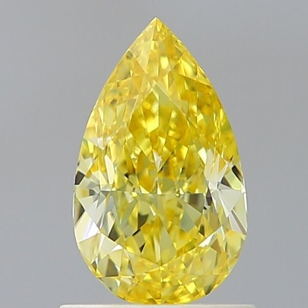 Loose Diamond - PEAR 1.23ct Fancy Vivid Yellow VS1: Loose Diamond - PEAR 1.23ct Fancy Vivid Yellow VS1 Source: This is a real non-mined Diamond that has been grown in a lab Shape: PEAR Carats: 1.23 Color: Fancy Vivid Yellow Certification: IGI Video: