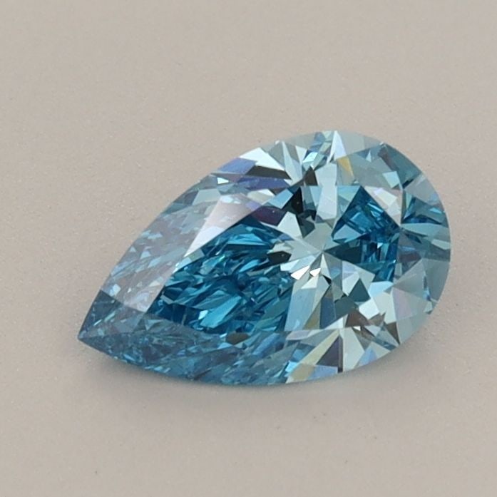 Loose Diamond - PEAR 0.53ct Fancy Vivid Blue VVS2: Loose Diamond - PEAR 0.53ct Fancy Vivid Blue VVS2 Source: This is a real non-mined Diamond that has been grown in a lab Shape: PEAR Carats: 0.53 Color: Fancy Vivid Blue Certification: IGI The Diamond 