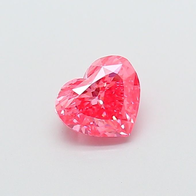 Loose Diamond - HEART 0.91ct Fancy Vivid Pink VS1: Loose Diamond - HEART 0.91ct Fancy Vivid Pink VS1 Source: This is a real non-mined Diamond that has been grown in a lab Shape: HEART Carats: 0.91 Color: Fancy Vivid Pink Certification: IGI Video: