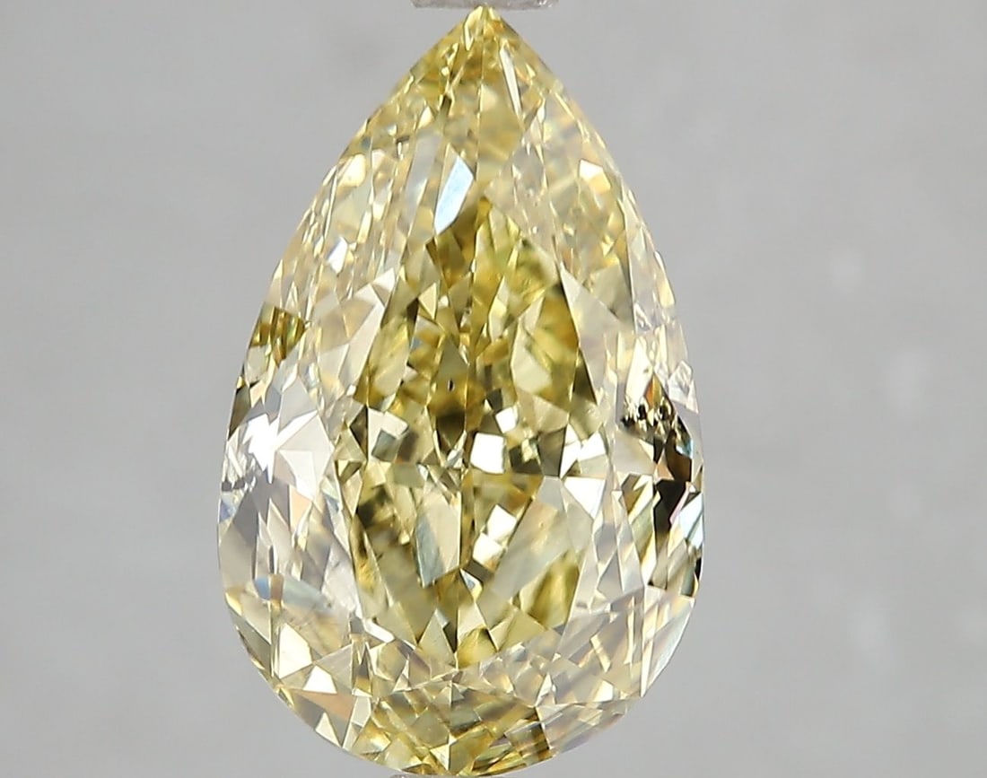 Loose Diamond - PEAR 5.05ct Fancy Intense Yellow SI1: Loose Diamond - PEAR 5.05ct Fancy Intense Yellow SI1 Source: This is a real non-mined Diamond that has been grown in a lab Shape: PEAR Carats: 5.05 Color: Fancy Intense Yellow Certification: IGI Video