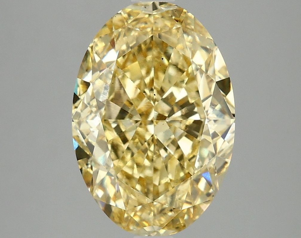 Loose Diamond - OVAL 4.1ct Fancy Vivid Yellow VS2: Loose Diamond - OVAL 4.1ct Fancy Vivid Yellow VS2 Source: This is a real non-mined Diamond that has been grown in a lab Shape: OVAL Carats: 4.1 Color: Fancy Vivid Yellow Certification: IGI Video: