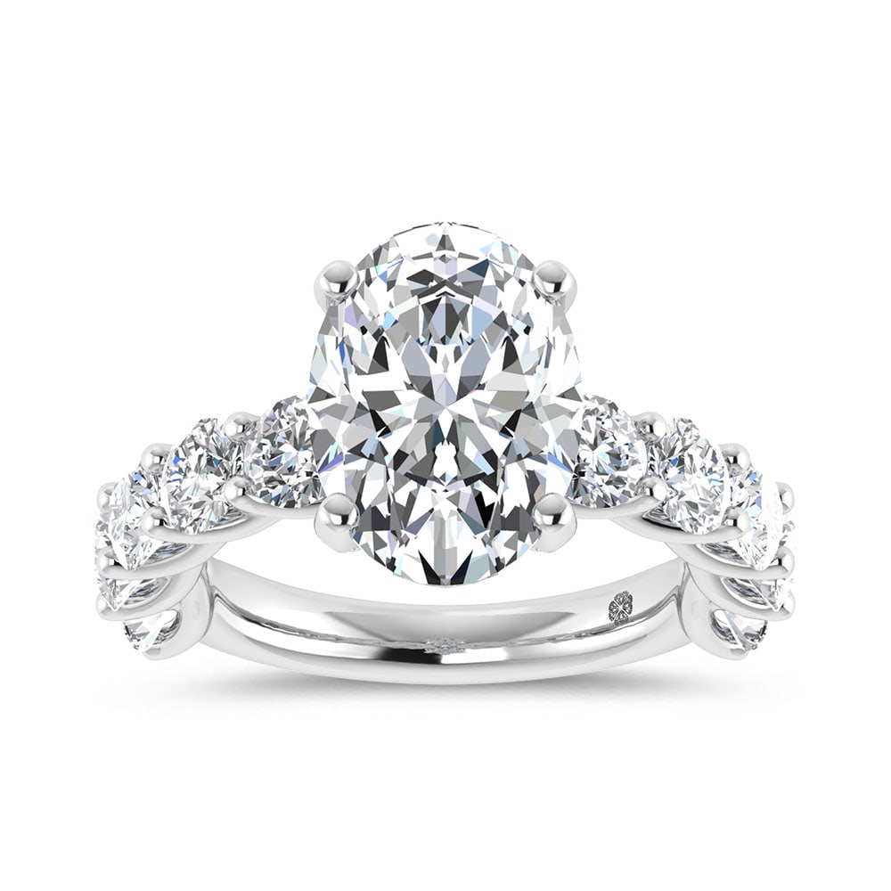 14K White Gold 7 3/4 Ct.Tw. Lab Grown Diamond Engagement Ring (IGI Certified Center 5ct): 14K White Gold 7 3/4 Ct.Tw. Lab Grown Diamond Engagement Ring (IGI Certified Center 5ct) This elegant diamond engagement ring crafted in 14k White gold, features a Oval -cut center stone of 5 ct that 