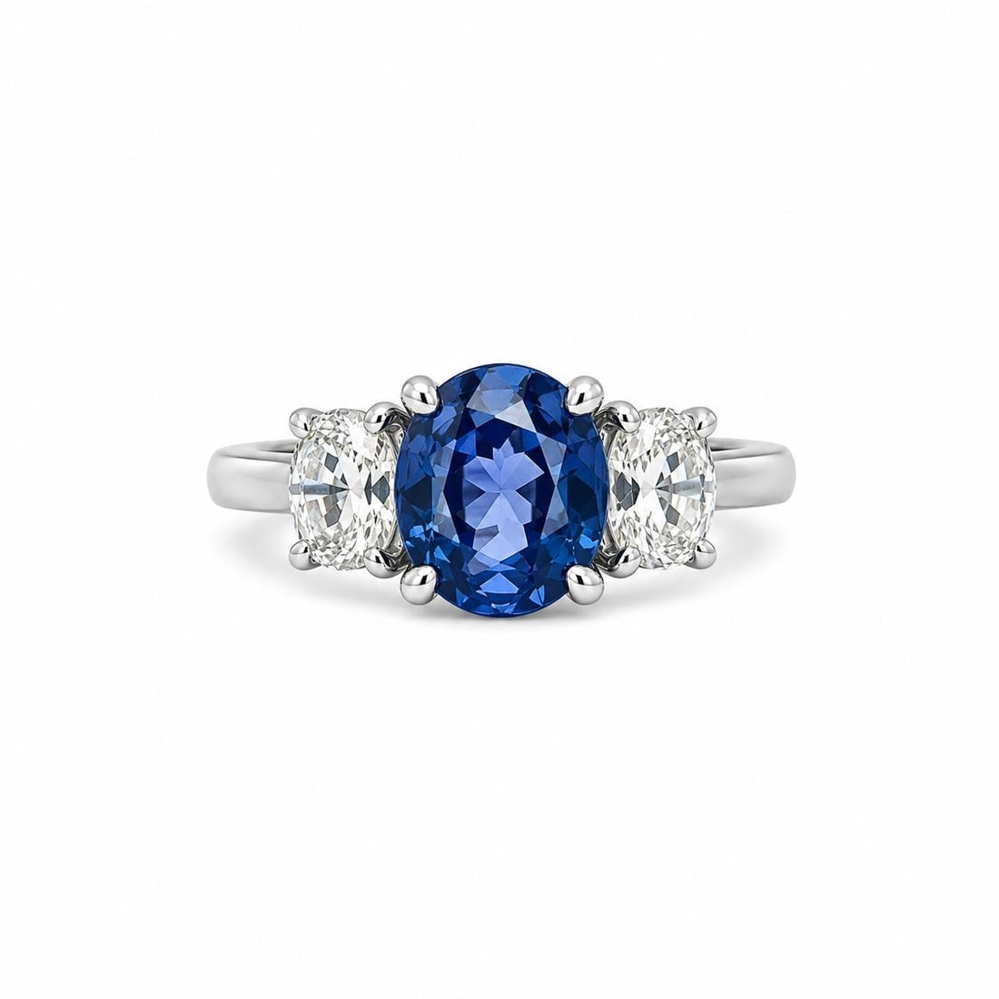 Platinum Cocktail Ring with GIA Burma No Heat Sapphire and Old Mine Diamonds: Platinum Cocktail Ring with GIA Burma No Heat Sapphire and Old Mine Diamonds Cocktail ring featuring a natural blue oval sapphire from Burma (Myanmar) with no indications of heating, accented by two o