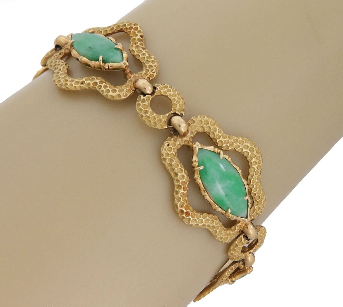 Vintage Unbranded 18k Yellow Gold Jade Oval Link Bracelet 7.25": Vintage Unbranded 18k Yellow Gold Jade Oval Link Bracelet 7.25" Vintage estate bracelet crafted in 18k yellow gold with sculptural oval links and natural jade accents. This wide articulated design off