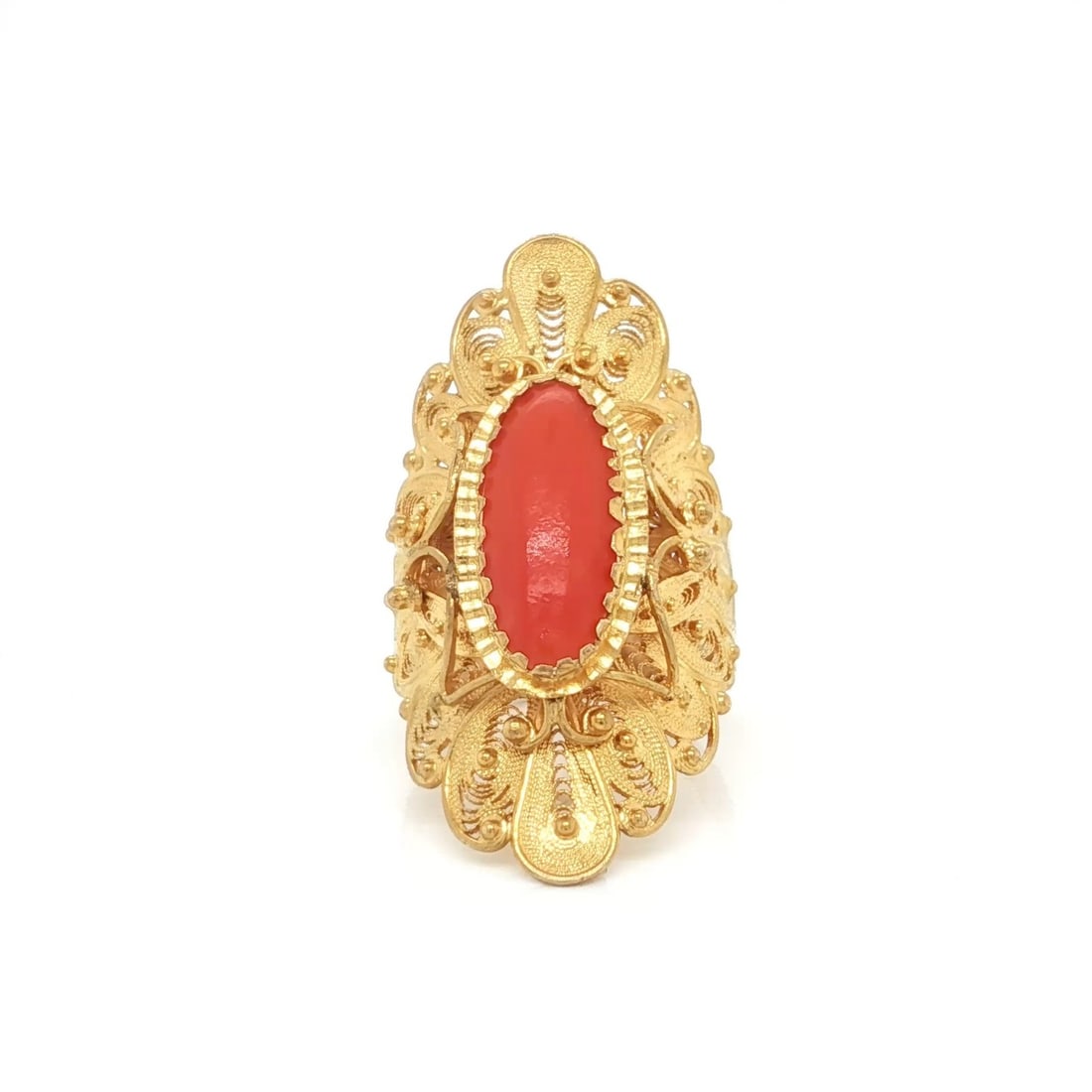 Unbranded Byzantine Filigree Coral Ring in 18k Yellow Gold Size 7: Unbranded Byzantine Filigree Coral Ring in 18k Yellow Gold Size 7 Vintage estate long finger ring in Byzantine style, crafted in solid 18k yellow gold with a natural coral centerpiece. The elongated f