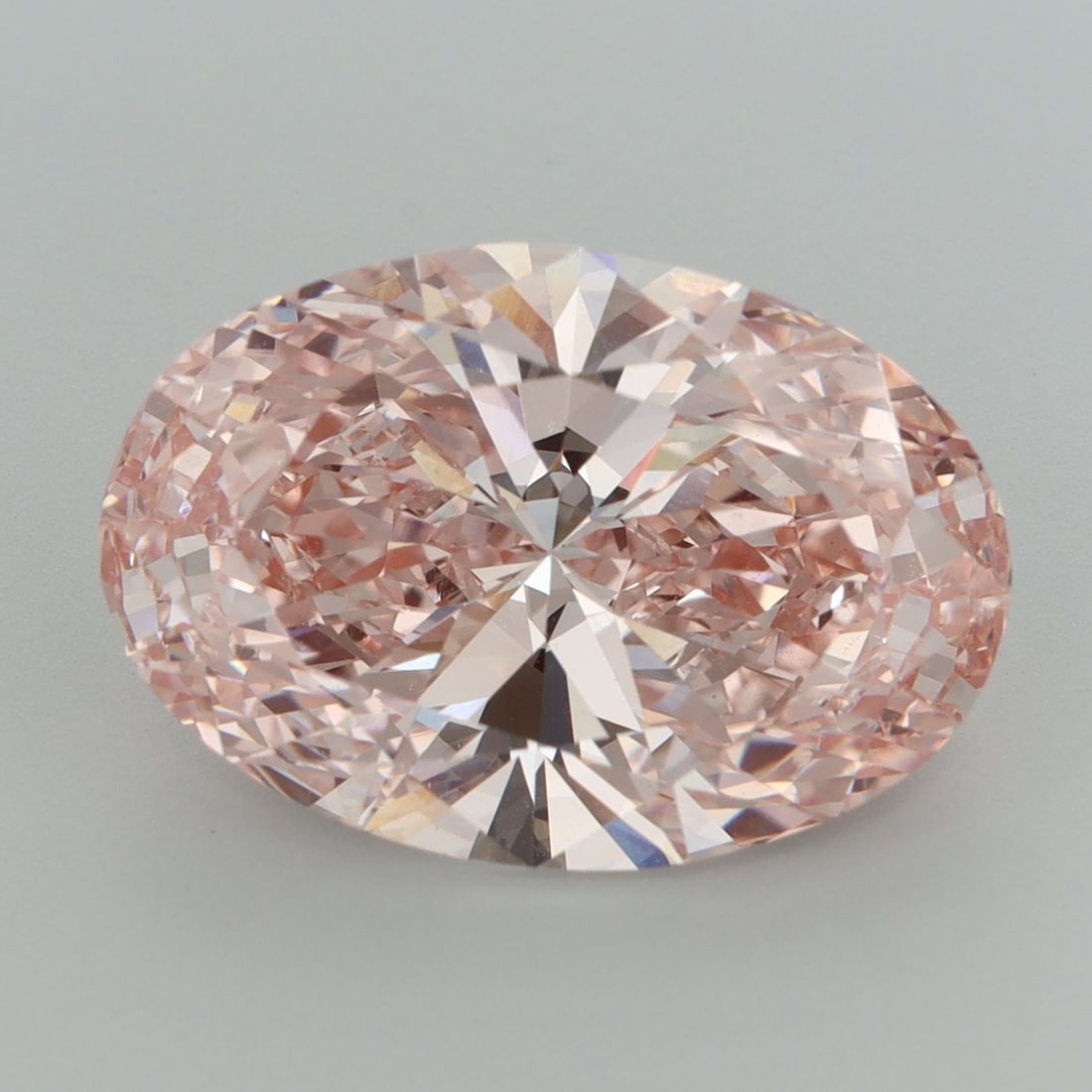 Loose Diamond - OVAL 8.0ct Fancy Vivid Pink VS2: Loose Diamond - OVAL 8.0ct Fancy Vivid Pink VS2 Source: This is a real non-mined Diamond that has been grown in a lab Shape: OVAL Carats: 8.0 Color: Fancy Vivid Pink Certification: IGI Video: