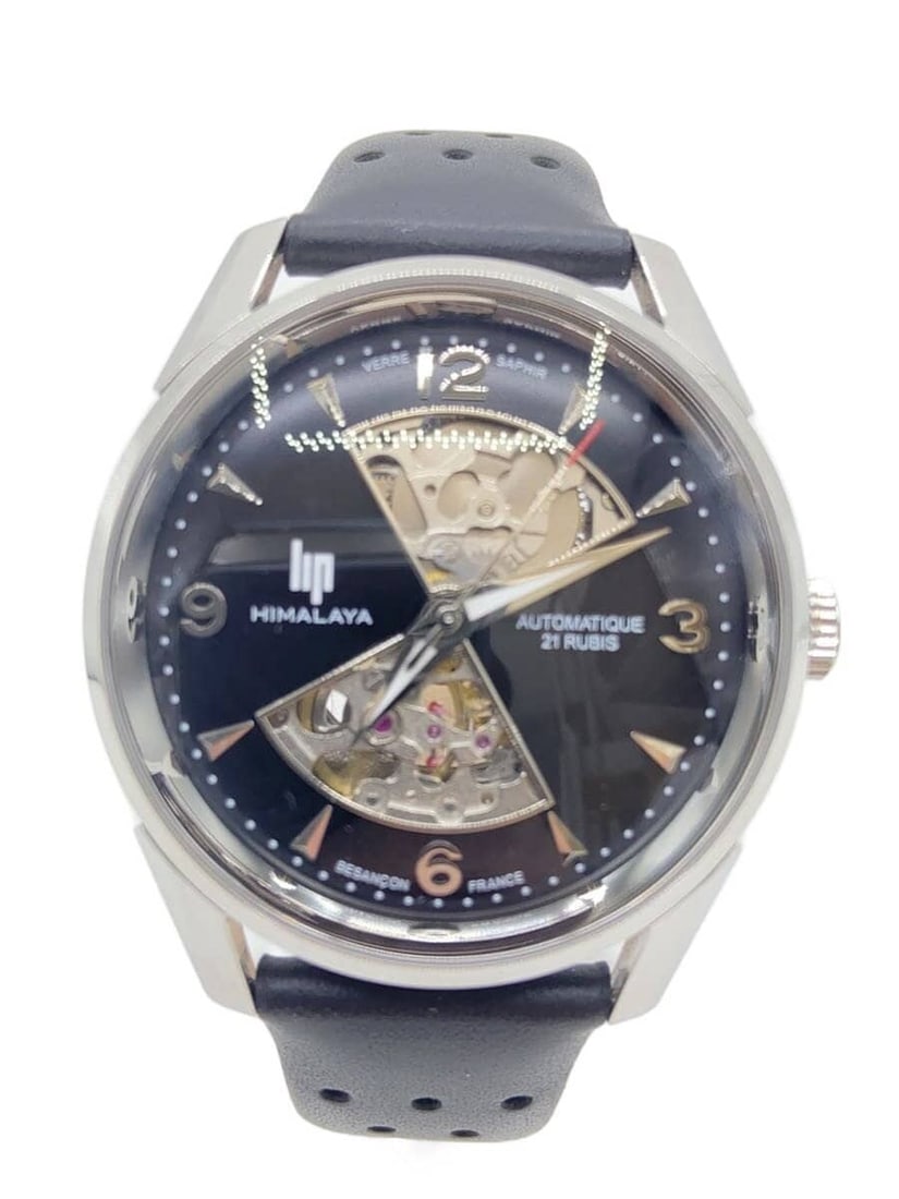 Lip France Men's Black Wristwatch 671573: Lip France Men's Black Wristwatch 671573 This men's wristwatch by lip features a black design and is crafted in France. The watch shows slight signs of use, with some scratches present on the band and