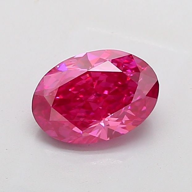 Loose Diamond - OVAL 2.1ct Fancy Vivid Pink VS1: Loose Diamond - OVAL 2.1ct Fancy Vivid Pink VS1 Source: This is a real non-mined Diamond that has been grown in a lab Shape: OVAL Carats: 2.1 Color: Fancy Vivid Pink Certification: IGI Video: Video