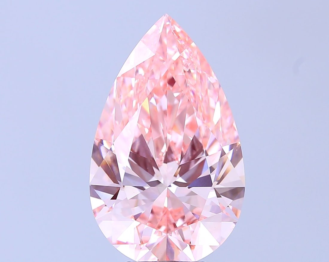 Loose Diamond - PEAR 8.06ct Fancy Vivid Pink VVS2: Loose Diamond - PEAR 8.06ct Fancy Vivid Pink VVS2 Source: This is a real non-mined Diamond that has been grown in a lab Shape: PEAR Carats: 8.06 Color: Fancy Vivid Pink Certification: IGI Video: