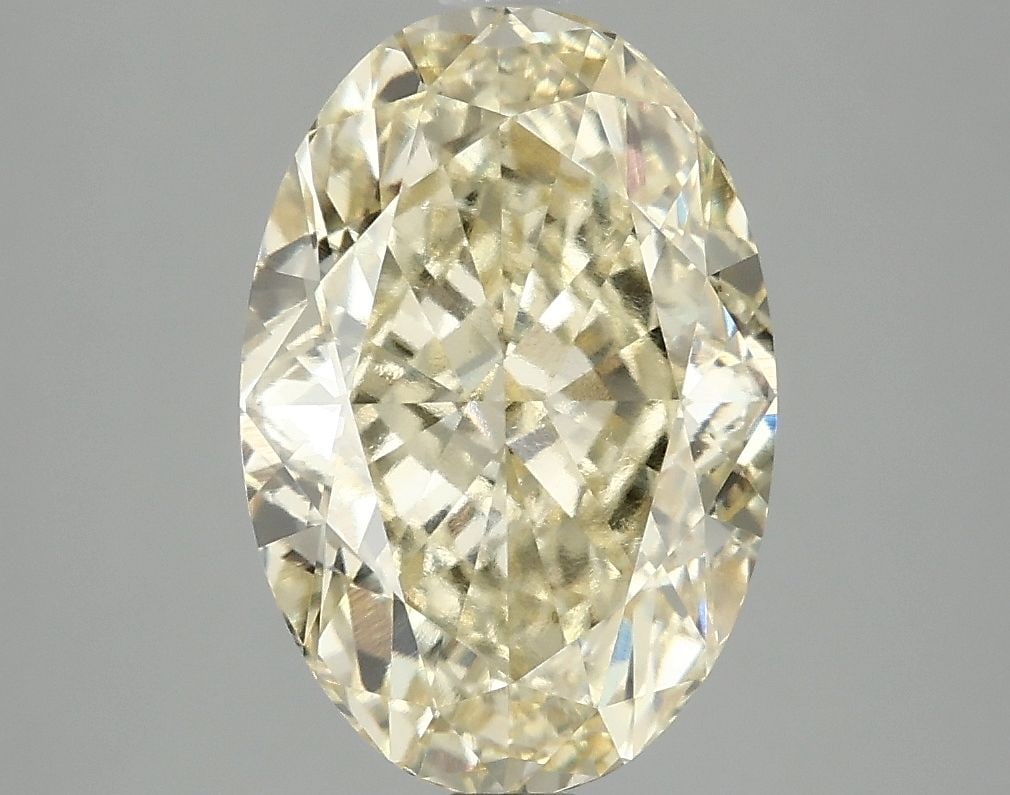 Loose Diamond - OVAL 4.07ct Fancy Intense Yellow VVS2: Loose Diamond - OVAL 4.07ct Fancy Intense Yellow VVS2 Source: This is a real non-mined Diamond that has been grown in a lab Shape: OVAL Carats: 4.07 Color: Fancy Intense Yellow Certification: IGI