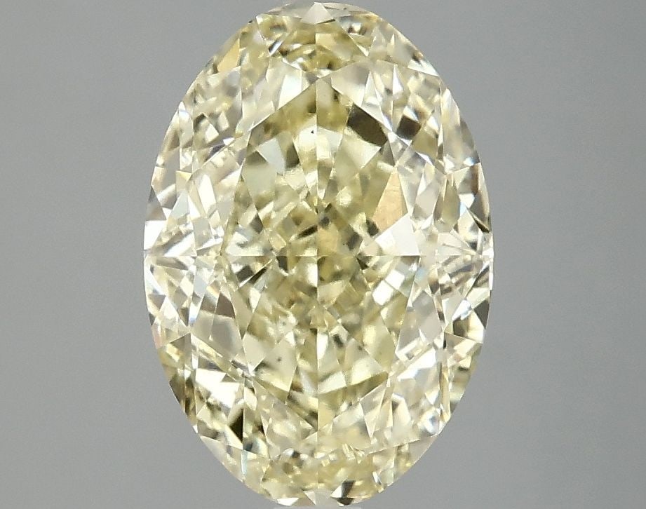 Loose Diamond - OVAL 3.08ct Fancy Vivid Yellow VS1: Loose Diamond - OVAL 3.08ct Fancy Vivid Yellow VS1 Source: This is a real non-mined Diamond that has been grown in a lab Shape: OVAL Carats: 3.08 Color: Fancy Vivid Yellow Certification: IGI Video: