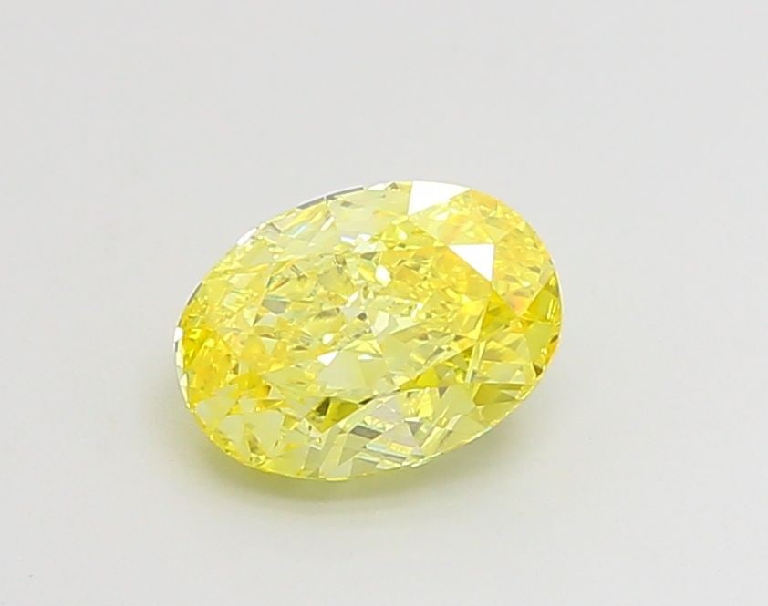 Loose Diamond - OVAL 1.51ct Fancy Vivid Yellow VS1: Loose Diamond - OVAL 1.51ct Fancy Vivid Yellow VS1 Source: This is a real non-mined Diamond that has been grown in a lab Shape: OVAL Carats: 1.51 Color: Fancy Vivid Yellow Certification: IGI Video: