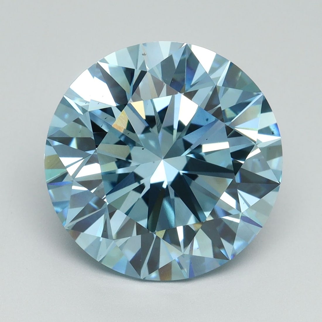 Ideal Loose Diamond - ROUND 7.05ct Fancy Vivid Blue VS2: Ideal Loose Diamond - ROUND 7.05ct Fancy Vivid Blue VS2 Source: This is a real non-mined Diamond that has been grown in a lab Shape: ROUND Carats: 7.05 Color: Fancy Vivid Blue Certification: IGI